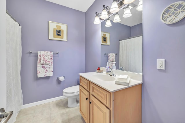 bathroom with vanity, tile patterned floors, an inviting chandelier, and toilet