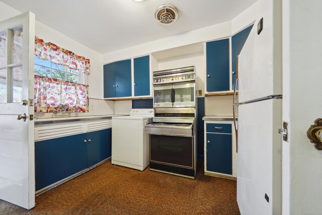 kitchen featuring blue cabinets, sink, range, dark carpet, and white fridge