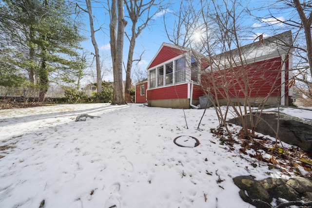 view of yard covered in snow