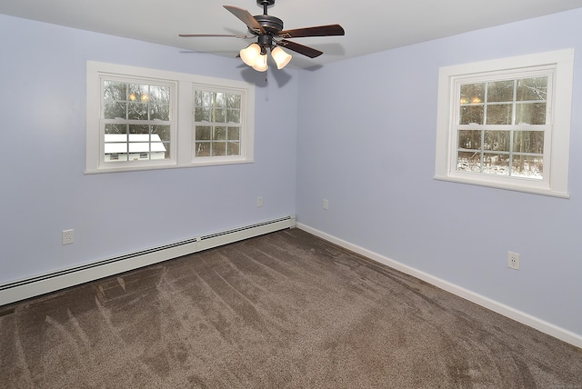 carpeted empty room with a baseboard heating unit and ceiling fan