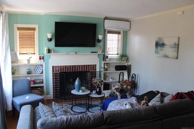 living room featuring hardwood / wood-style flooring, ornamental molding, a wall mounted air conditioner, and a brick fireplace