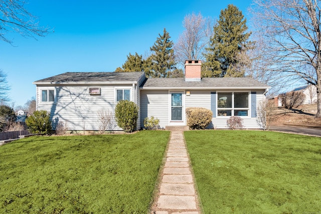 view of front of house with a front lawn