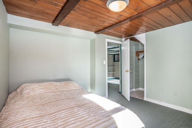 carpeted bedroom with wood ceiling, a closet, and beamed ceiling