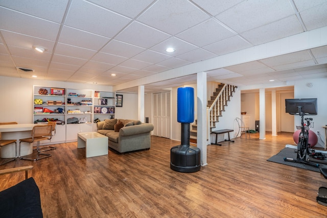 workout area with wood-type flooring