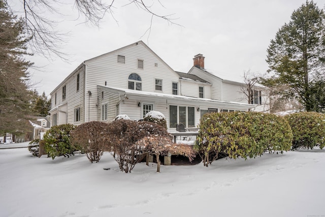 view of snow covered property