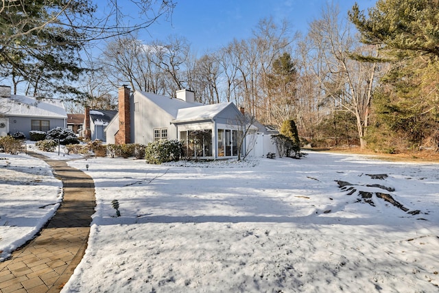 view of snow covered property