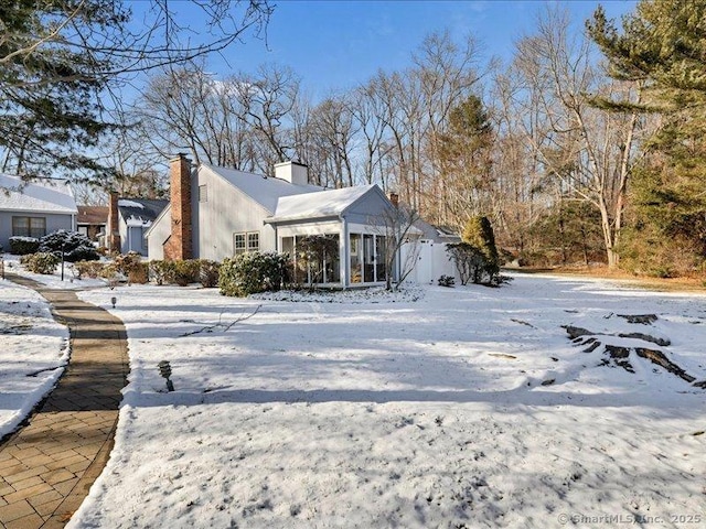 view of snow covered property