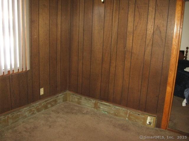 38 New Haven Rd, Seymour, CT 06483 - detailed view of wooden walls and carpet floors