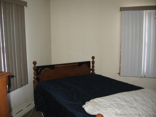 38 New Haven Rd, Seymour, CT 06483 - bedroom with a baseboard heating unit