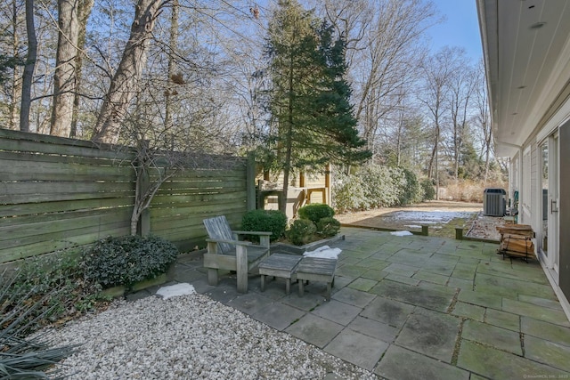 view of patio with central AC