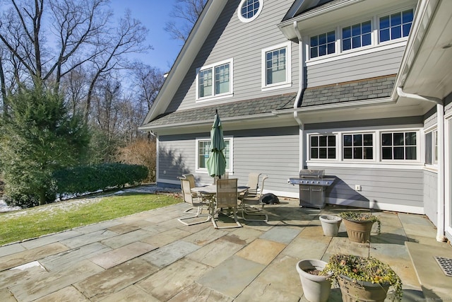 rear view of house with a patio area