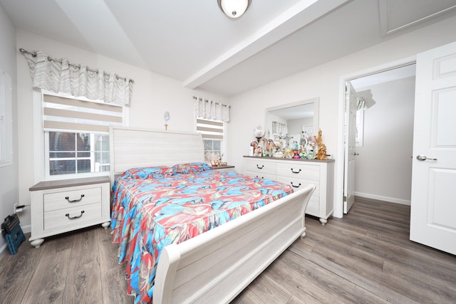 bedroom featuring dark hardwood / wood-style flooring