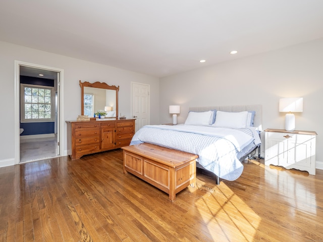 bedroom featuring hardwood / wood-style flooring