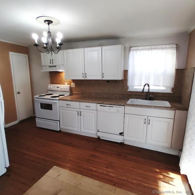 kitchen with sink, white appliances, dark wood-type flooring, white cabinetry, and an inviting chandelier