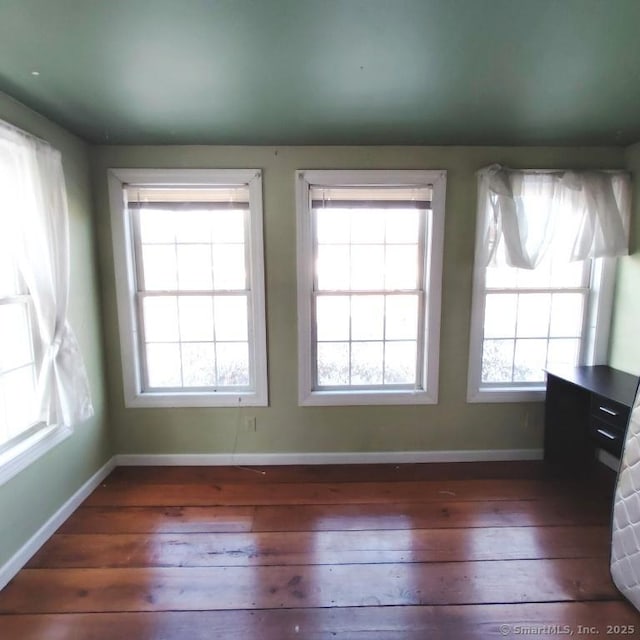 interior space with dark hardwood / wood-style flooring