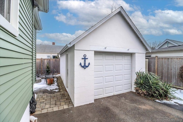 detached garage with fence