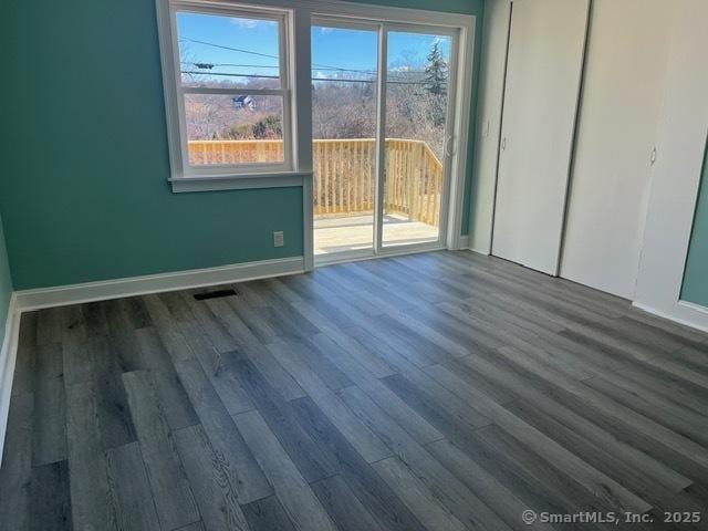 interior space with dark wood-type flooring