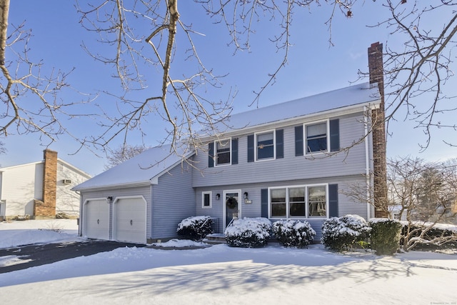 view of front of house with a garage