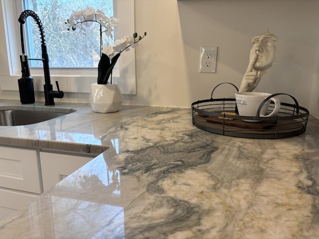 details with sink and white cabinets