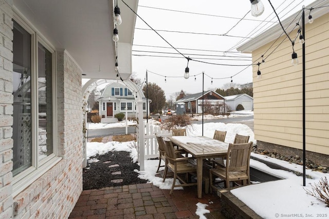 view of snow covered patio