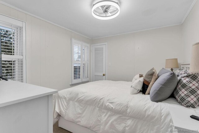 bedroom featuring ornamental molding