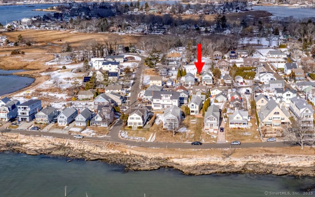 drone / aerial view with a water view