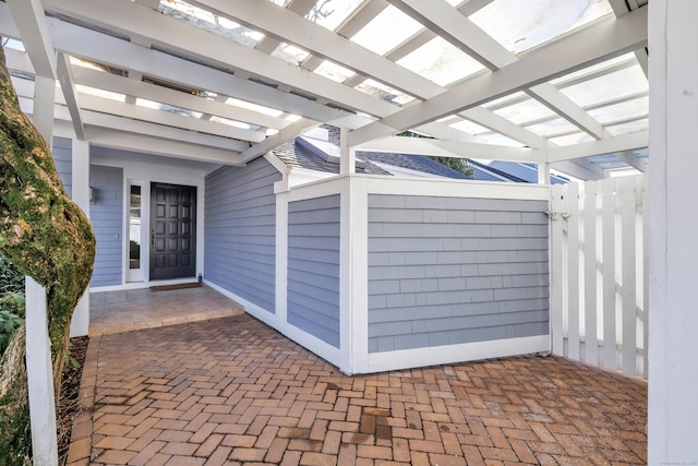 property entrance with a patio area