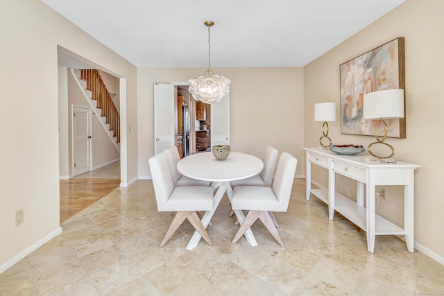 dining room featuring an inviting chandelier