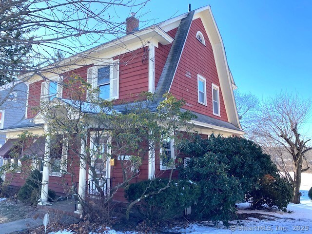 view of snow covered property