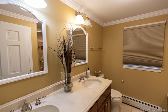 bathroom featuring crown molding, tile patterned flooring, vanity, a baseboard radiator, and toilet