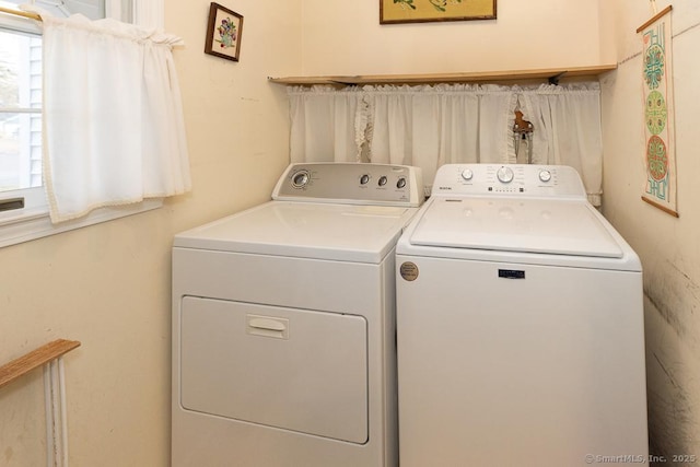 washroom with washer and clothes dryer