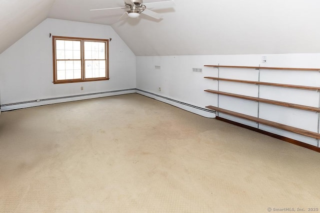 bonus room with ceiling fan, lofted ceiling, and carpet