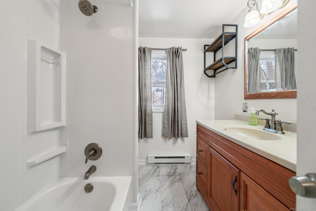 bathroom with a baseboard radiator, vanity, and shower / bathing tub combination