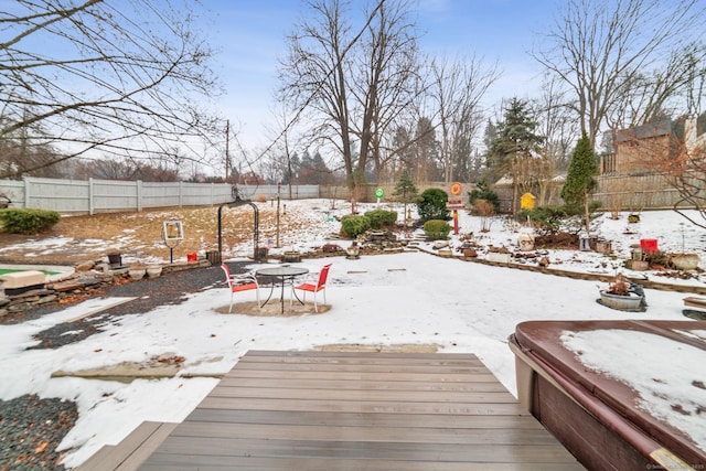 view of snow covered deck