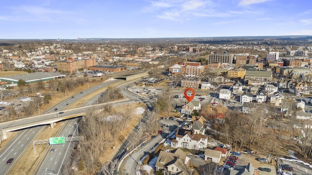 birds eye view of property featuring a city view