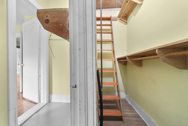 spacious closet with wood finished floors