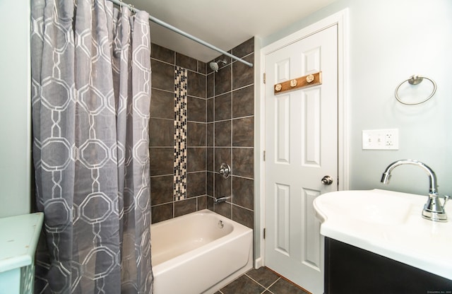 bathroom featuring shower / tub combo with curtain, vanity, and tile patterned floors