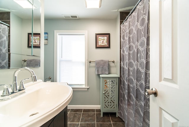 bathroom featuring vanity and tile patterned floors