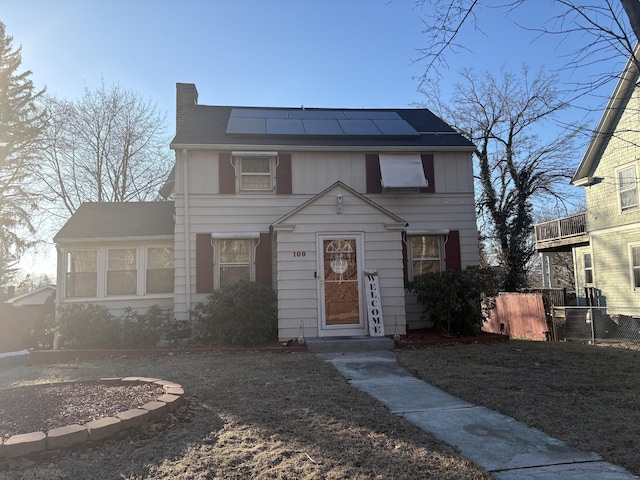 view of front of home with solar panels