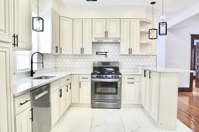 kitchen featuring sink, hanging light fixtures, exhaust hood, kitchen peninsula, and stainless steel appliances