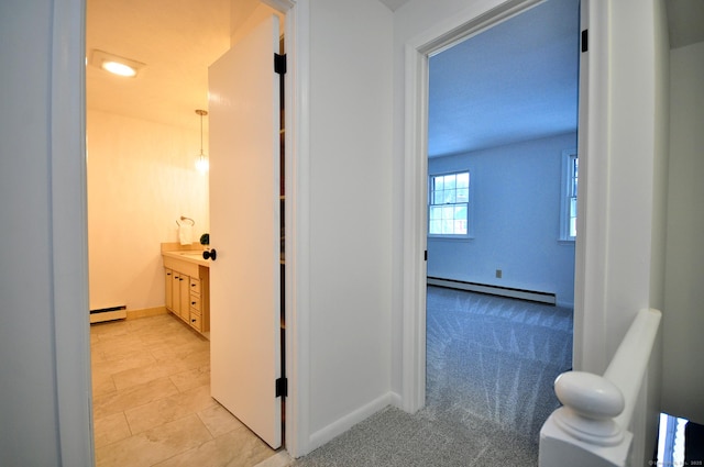 bathroom with baseboard heating