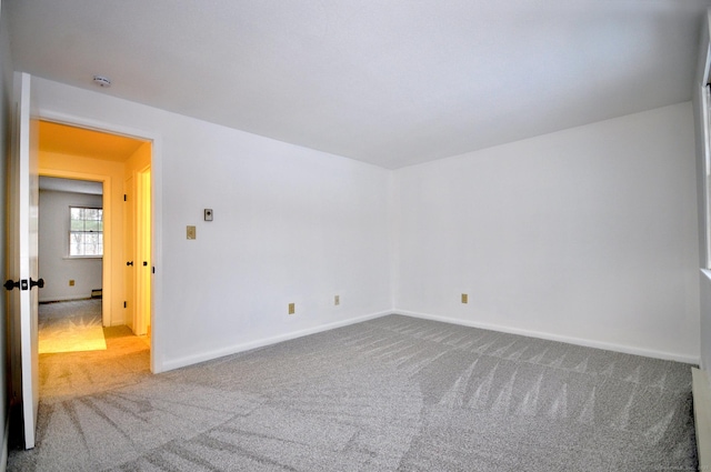 empty room featuring carpet floors