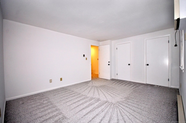 unfurnished bedroom featuring carpet flooring