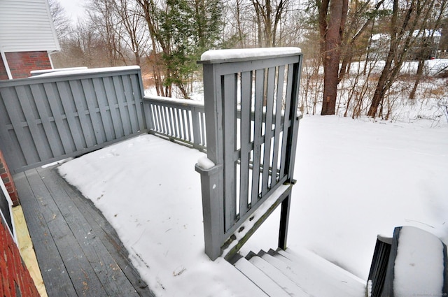 view of snow covered deck