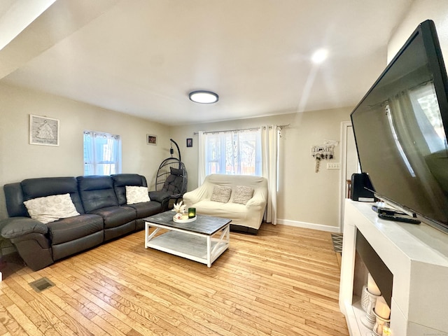 living room featuring light wood-type flooring