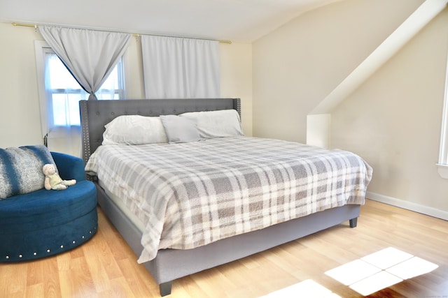 bedroom featuring hardwood / wood-style flooring