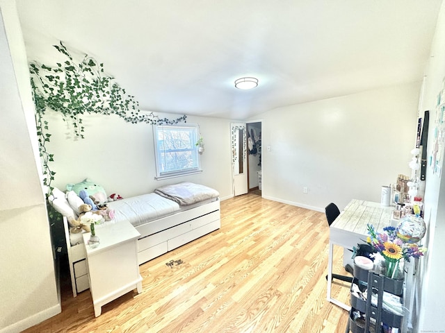 bedroom with light wood-type flooring