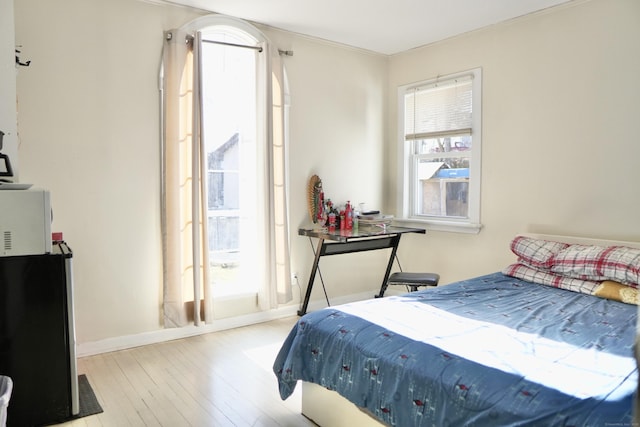 bedroom featuring light wood-type flooring