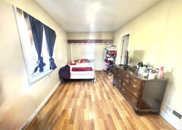 bedroom featuring light hardwood / wood-style floors