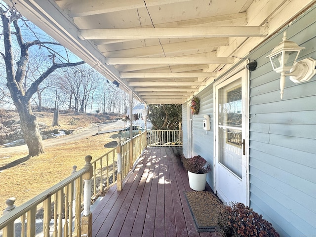 deck featuring covered porch